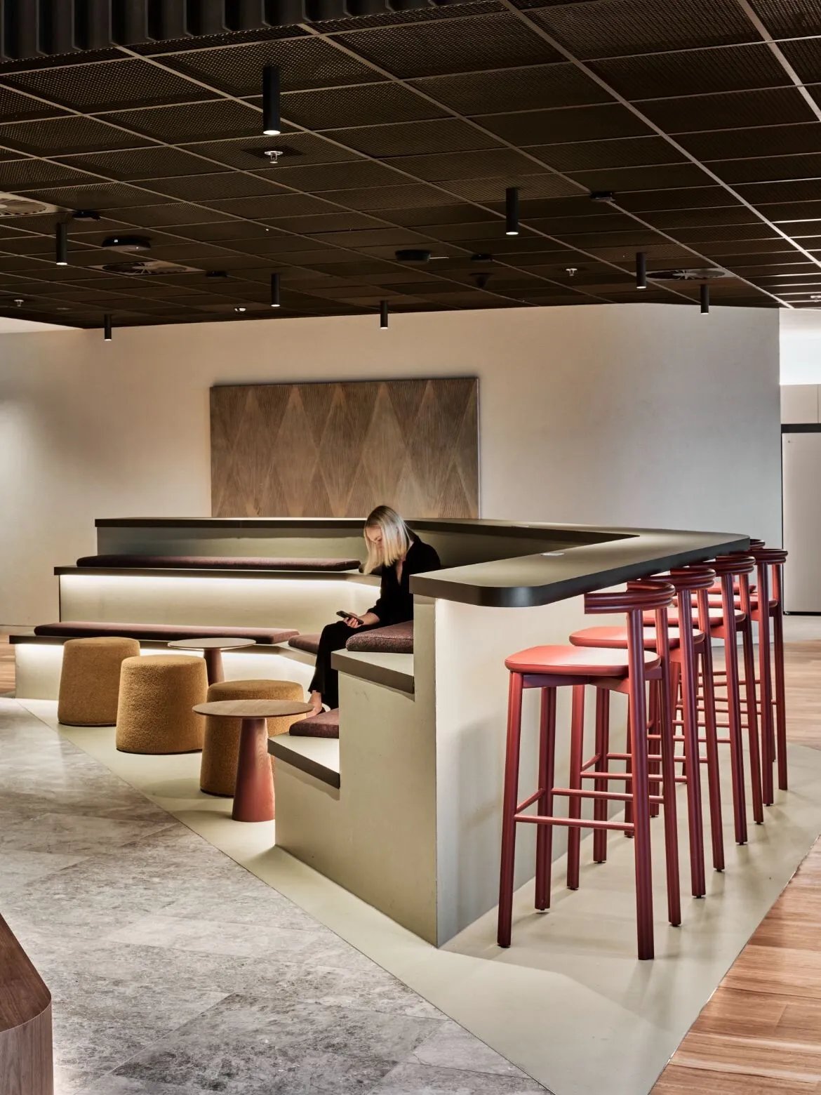 Stone and resilient flooring in a busy commercial interior